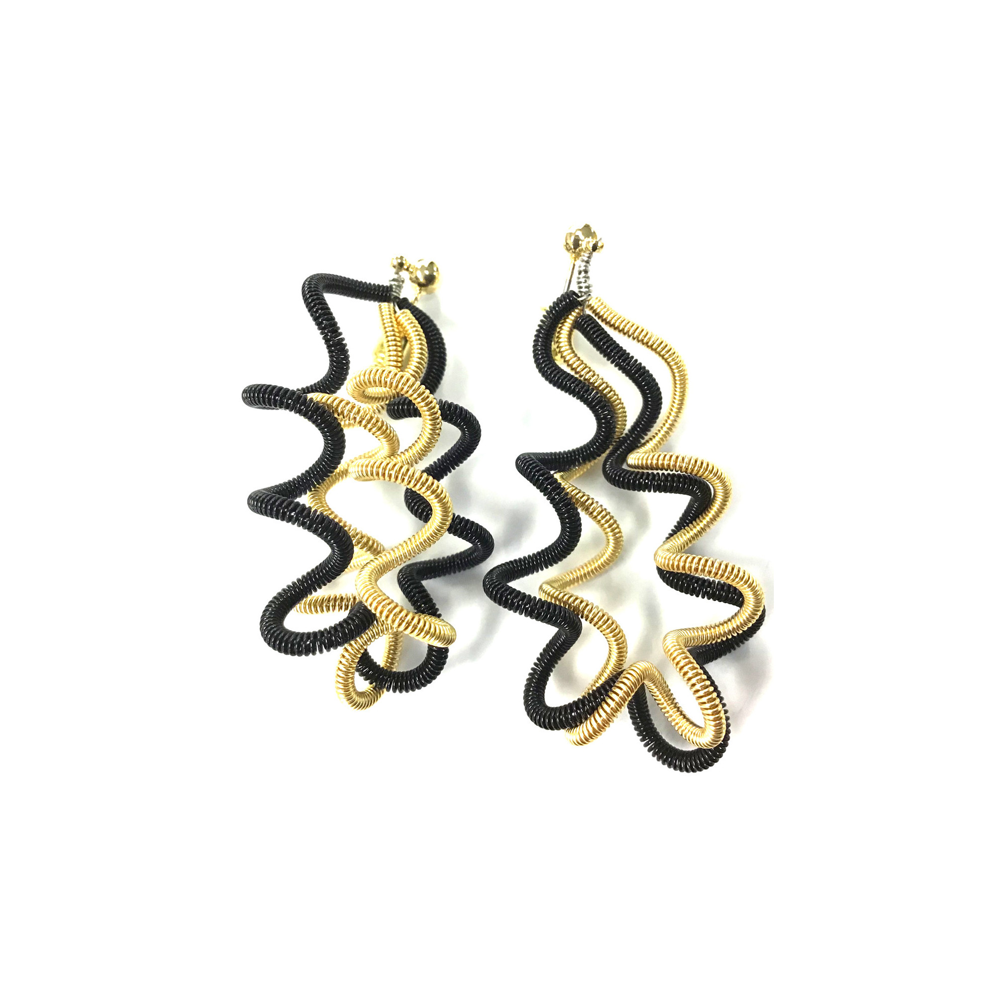 SANDRINE GIRAUD'S UNIQUE EARRINGS